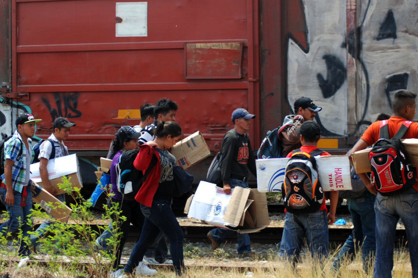 Central American migrants about to board la Bestia (the Beast), the infamous train that will carry them across Mexico.